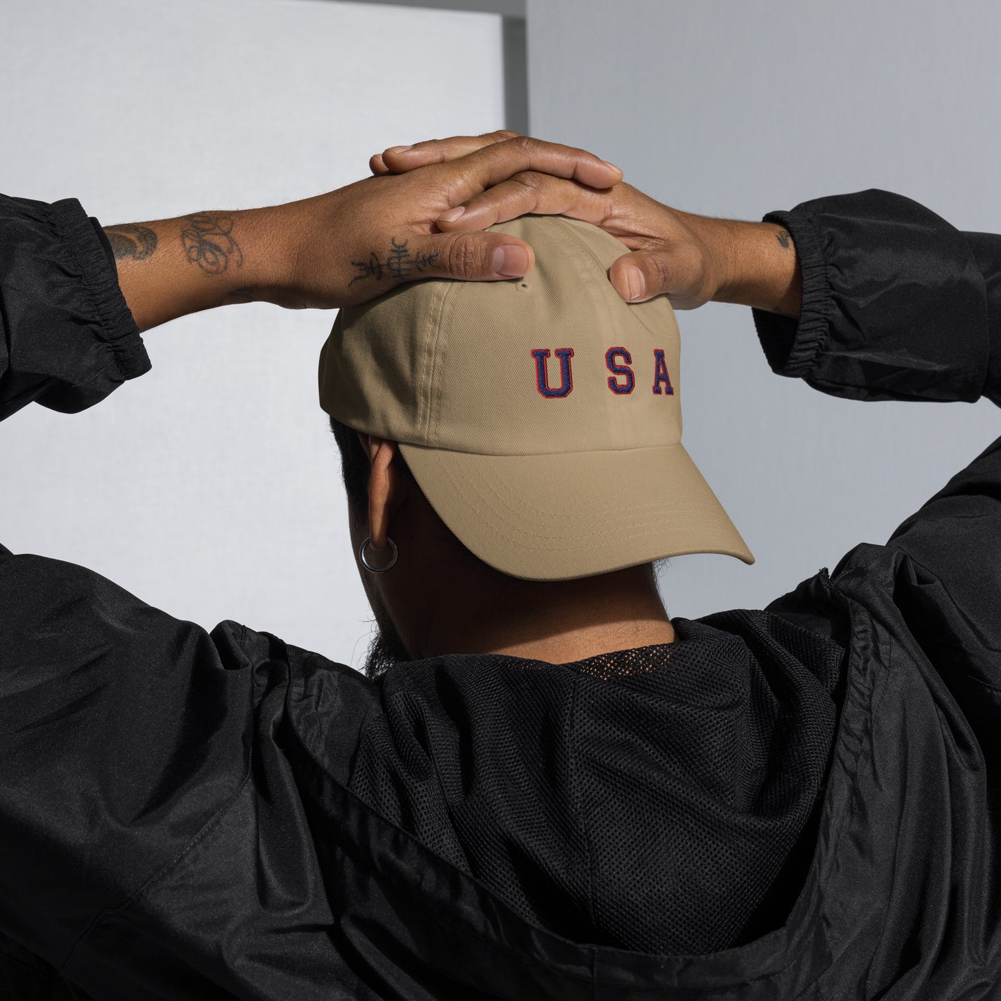 hat with "USA" text across the front in navy and red- khaki hat