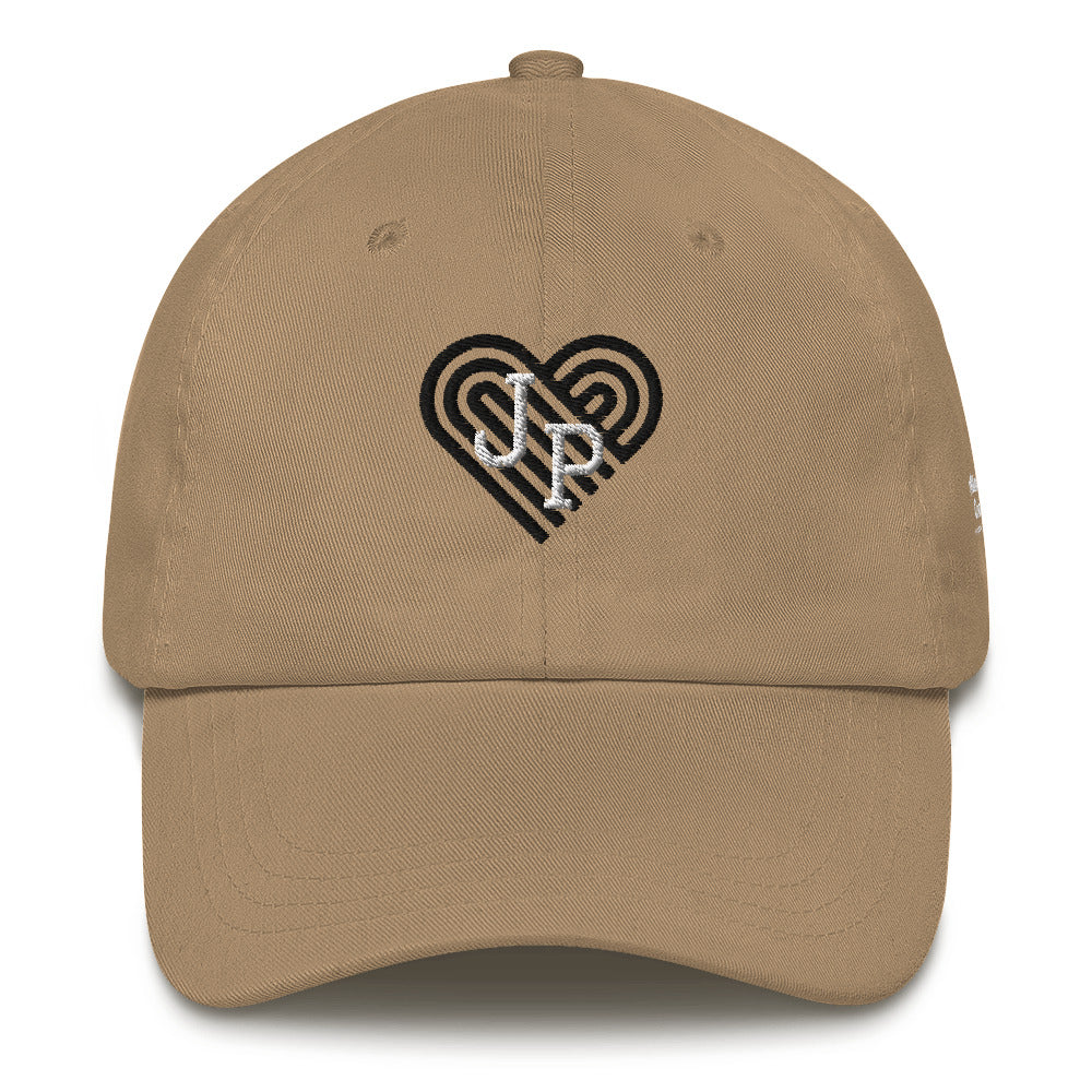Jamaica Plain hat, with black heart behind "JP" letters in white. The hat is khaki.