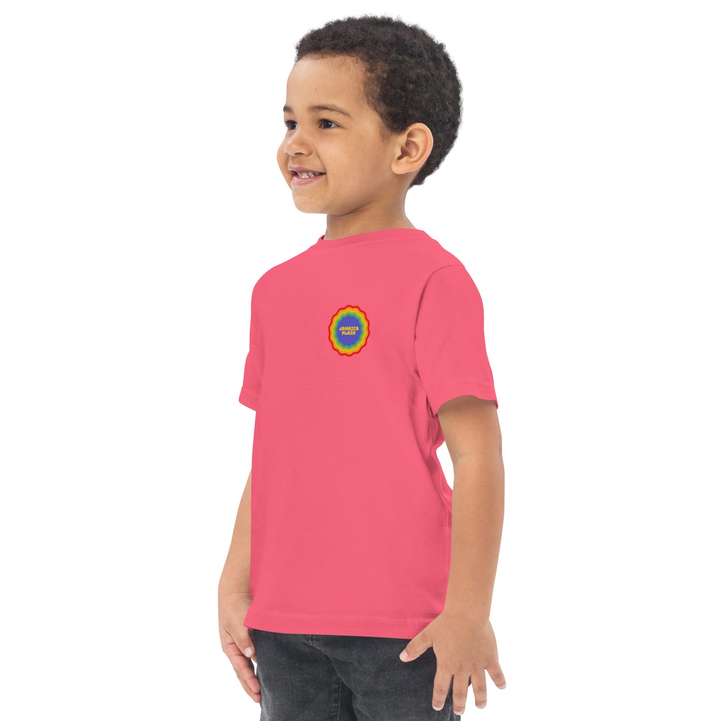 Jamaica Plain, Boston in a rainbow badge, pink, on model