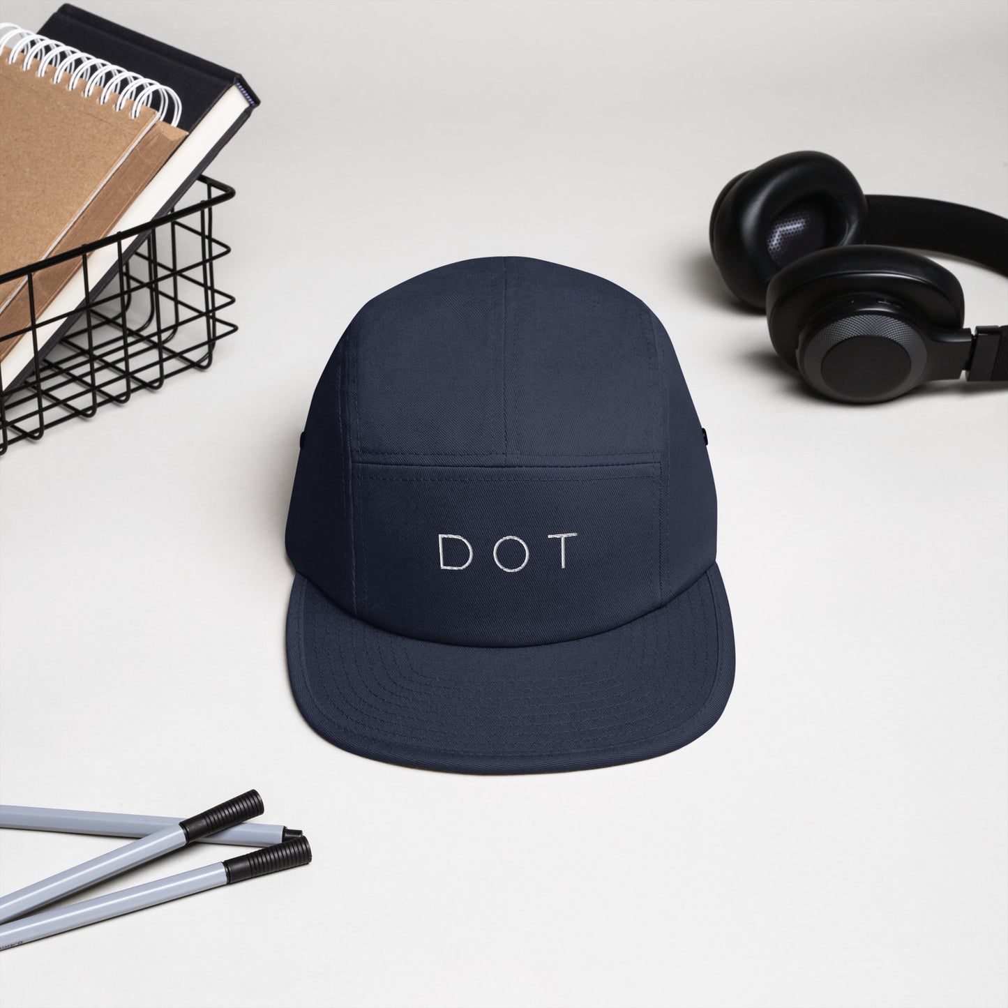 Dorchester "DOT" 5-panel Hat, with items in background, blue