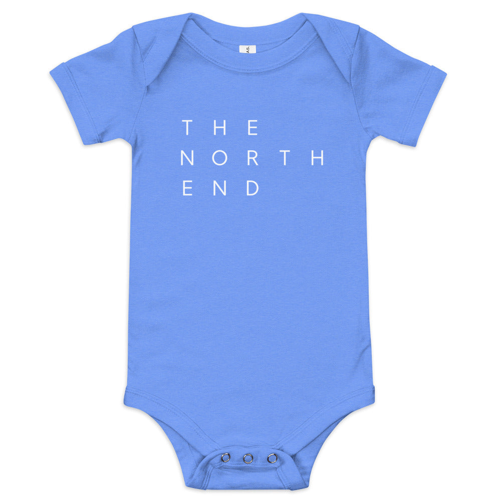 blue onesie with the text "The North End " in white.