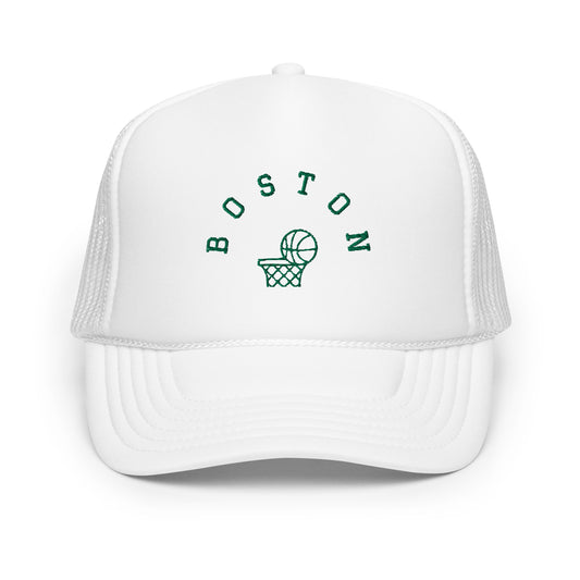 White hat-Text "Boston" in green with image of basketball going into hoop.