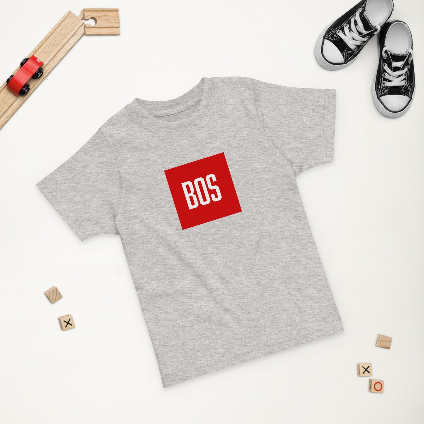 Youth Boston "BOS" T Shirt, grey, shoes and toys in background