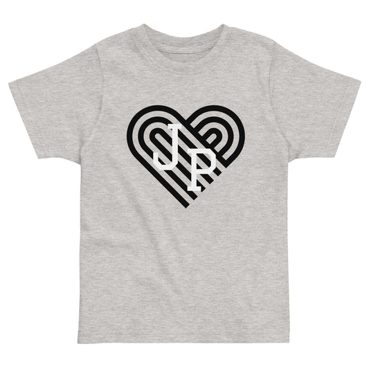 Jamaica Plain T shirt, with black heart behind "JP" letters in white. The shirt is grey.