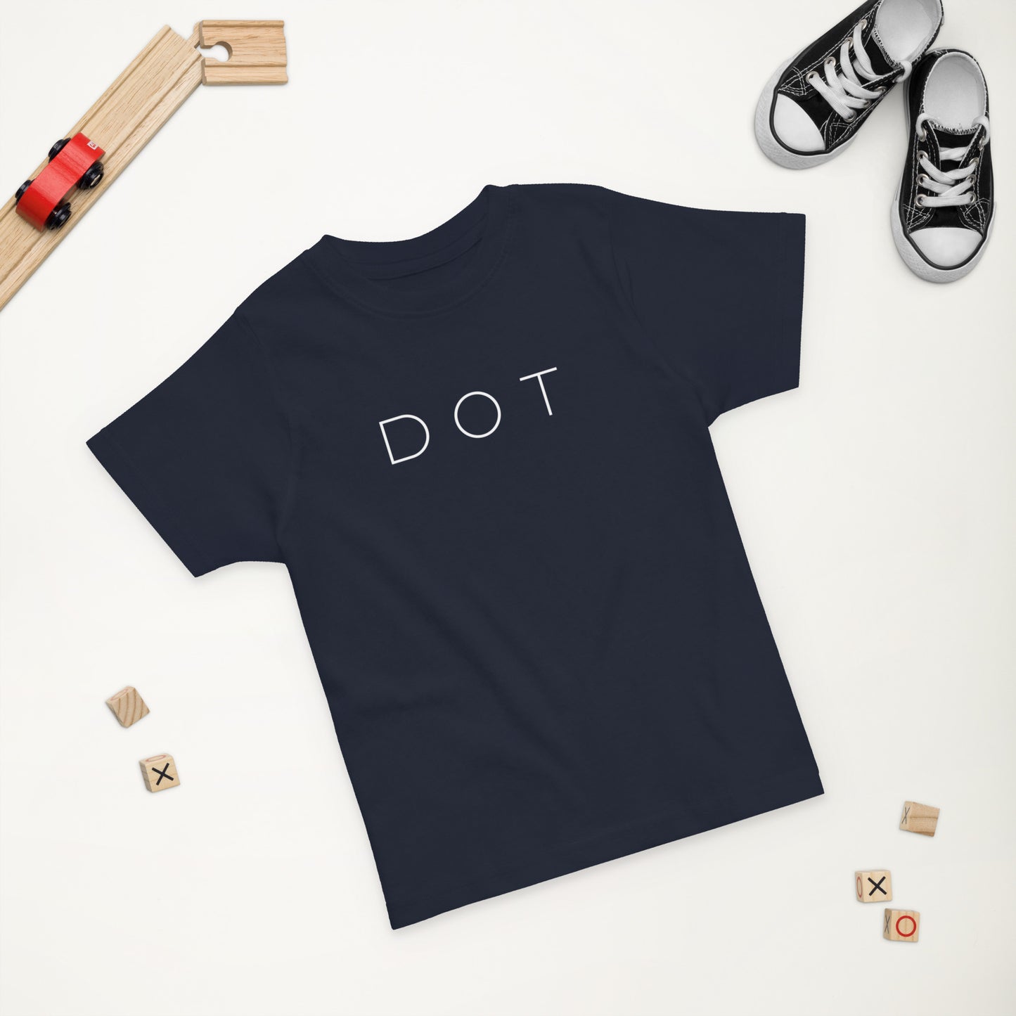 Dorchester "DOT" Tee (Toddler), toys in the background, blue