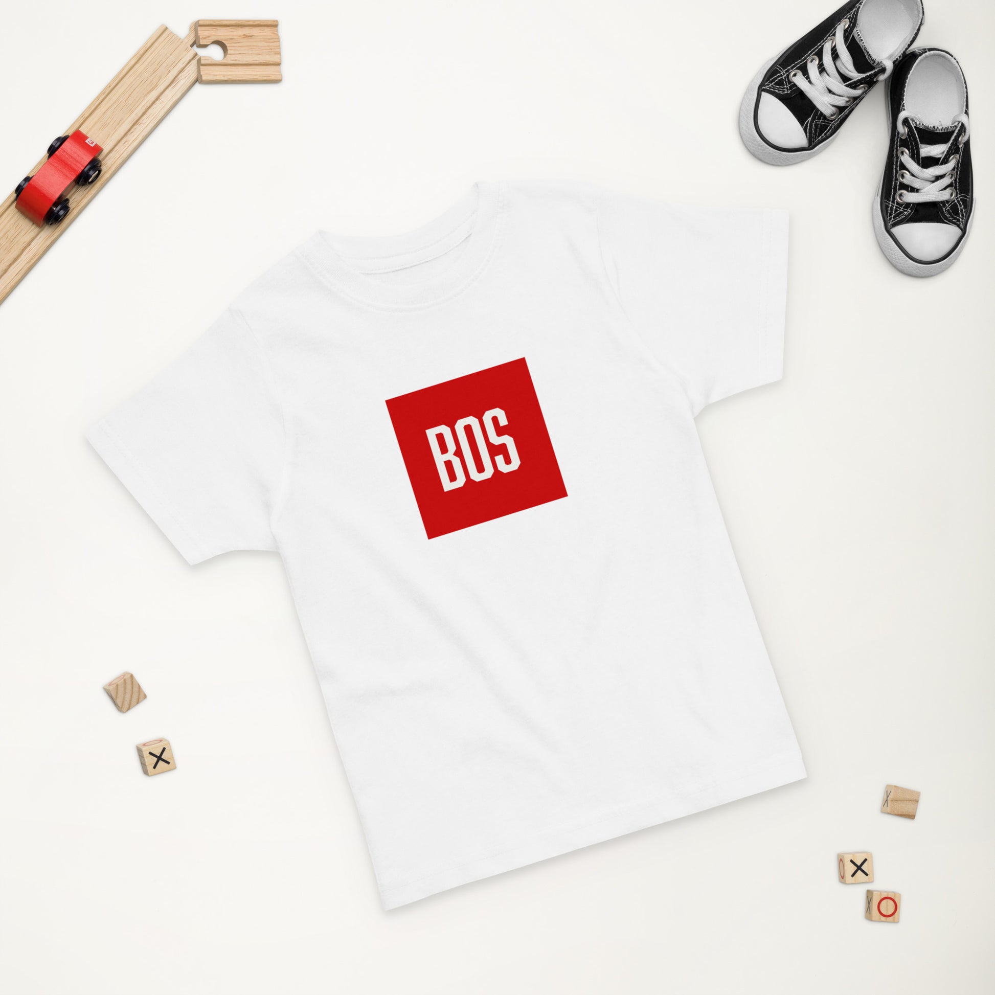 Youth Boston "BOS" T Shirt, white, shoes and toys in background