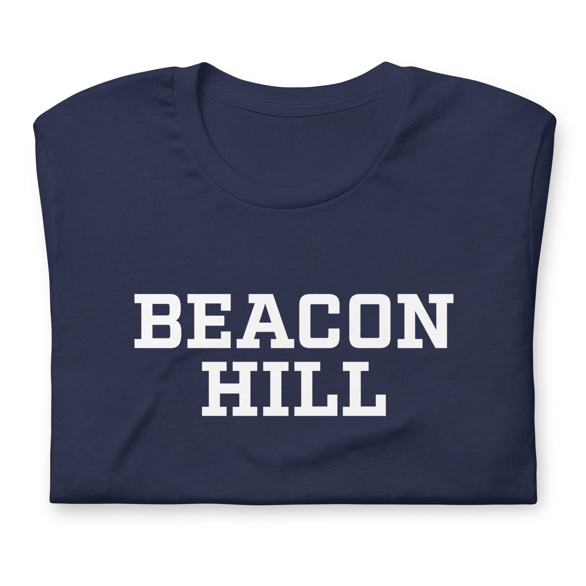 Graphic t shirt displaying "Beacon Hill", a neighborhood in Boston, MA. The shirt shown is navy, folded.