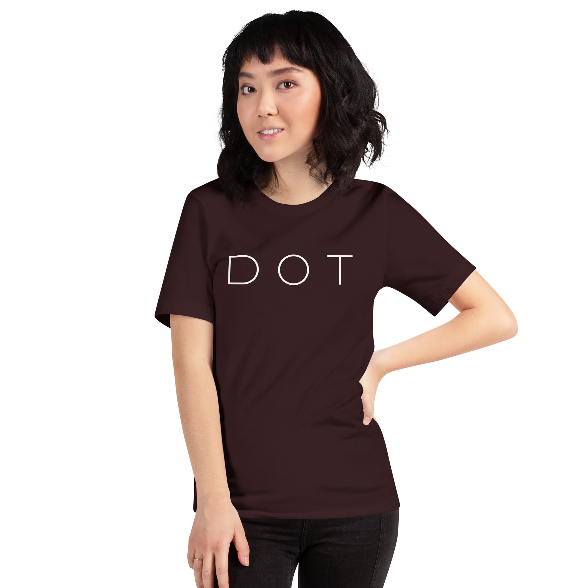 Dorchester t shirt, with "DOT" in white font, deep red shirt, on model